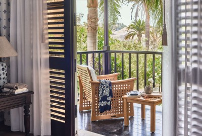 Wooden and furnished balcony in superior room